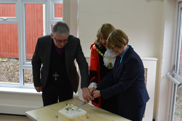 28 April: Cutting the 60th birthday cake at Patronal Festival lunch